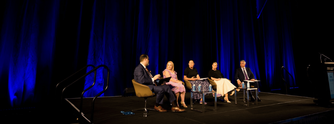 Wide view of panel at National Housing Conference 2023