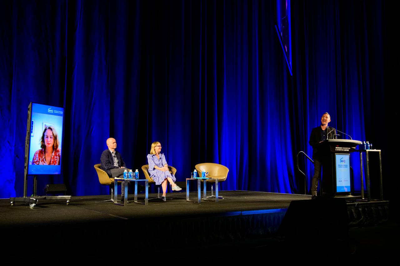 Wide view of discussion panel at National Housing Conference 2023