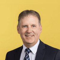 Profile image of David Reynolds, PSM against yellow background