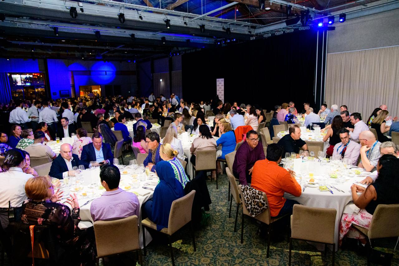 Wide view of conference breakfast event