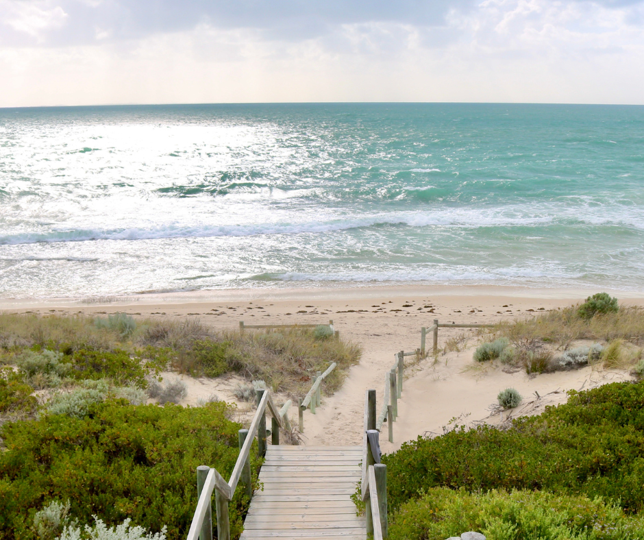 Long shot of boardwalk leading towards Perth beach in daylight