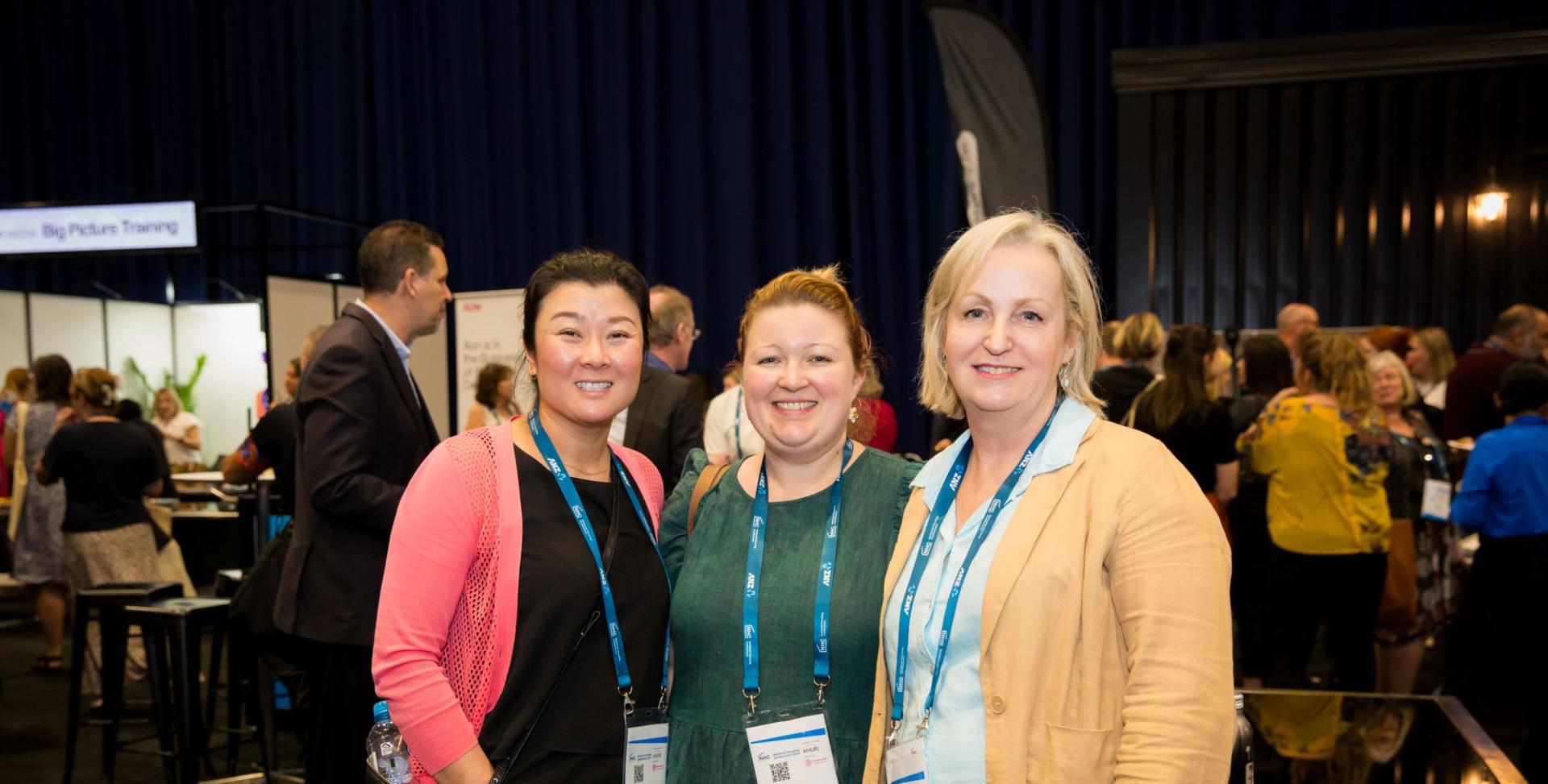People smiling at National Housing Conference 2023