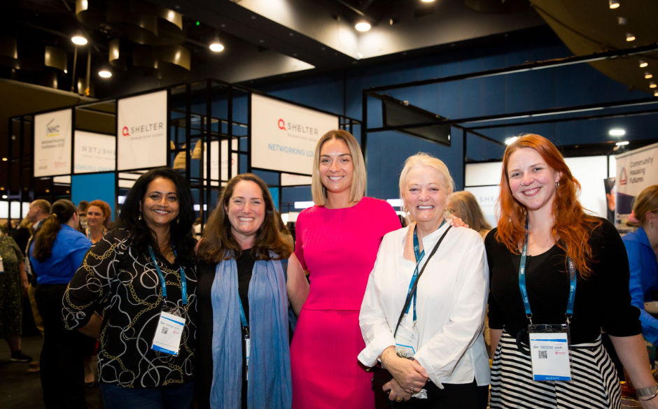People smiling at National Housing Conference 2023